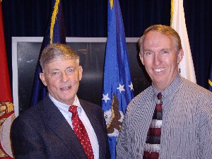 In April, Gen. James McCarthy, USAF (Ret.) (r), director of the Institute for Information Technology Application (IITA) at the U.S. Air Force Academy, receives a Wounded Warrior donation from Col. John Hayes, USAF (Ret.), chapter vice president for programs.